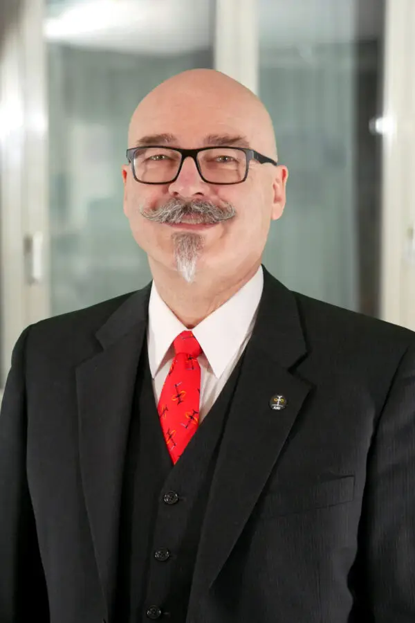 Dr. Zane Gard 1 a man in a suit and tie