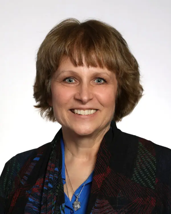 Dr. Kathy Bloom 1 a woman smiling for a picture